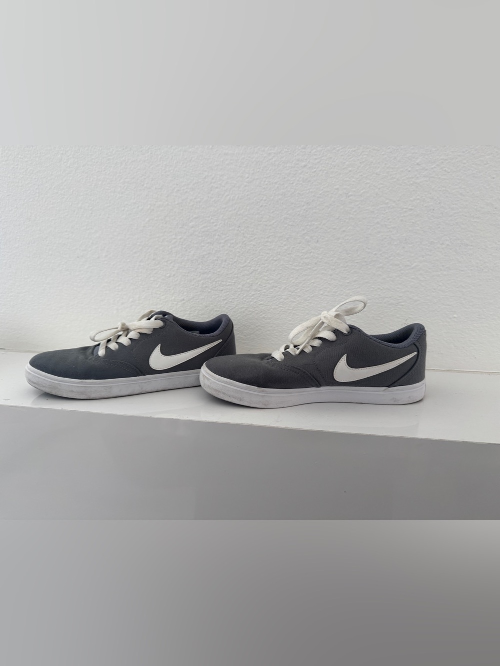 Nike Gray Low-Top Sneakers with White Swoosh